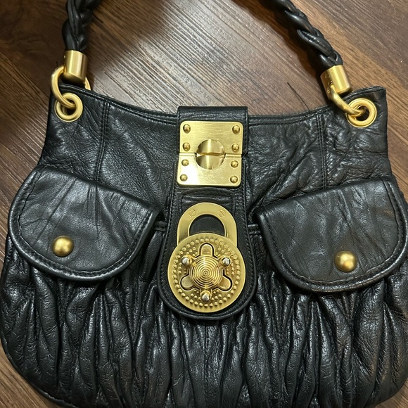 black leather purse with gold clasp. STEVEN by Steve Madden - Picture 6 of 6